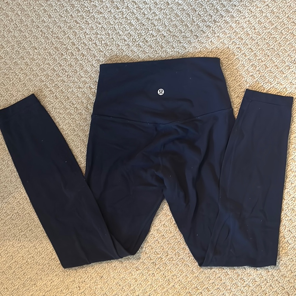Navy blue lululemon 25” leggings.